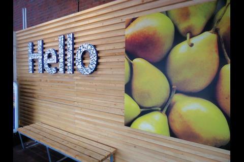 Wooden panels – an effort to “warm up” the store environment – are evident throughout the Thetford and Bishop’s Stortford stores, from the cladding surrounding the ‘hello’ at the entrance to the fresh food counters